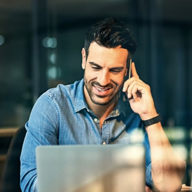 Happy man on the phone